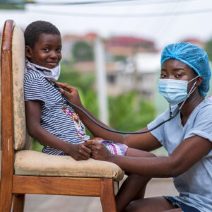 closeup-shot-boy-getting-checkup-by-doctor