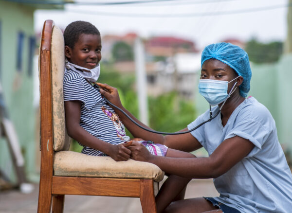 closeup-shot-boy-getting-checkup-by-doctor